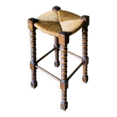 High wooden turned stool