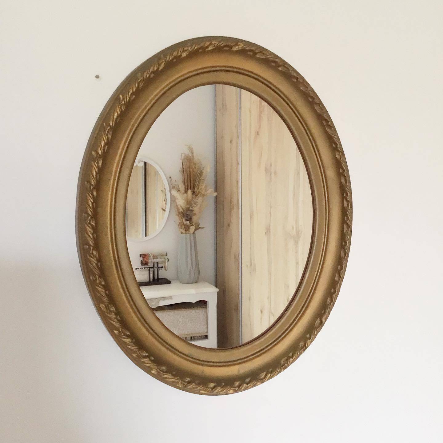 Vintage oval gold mirror