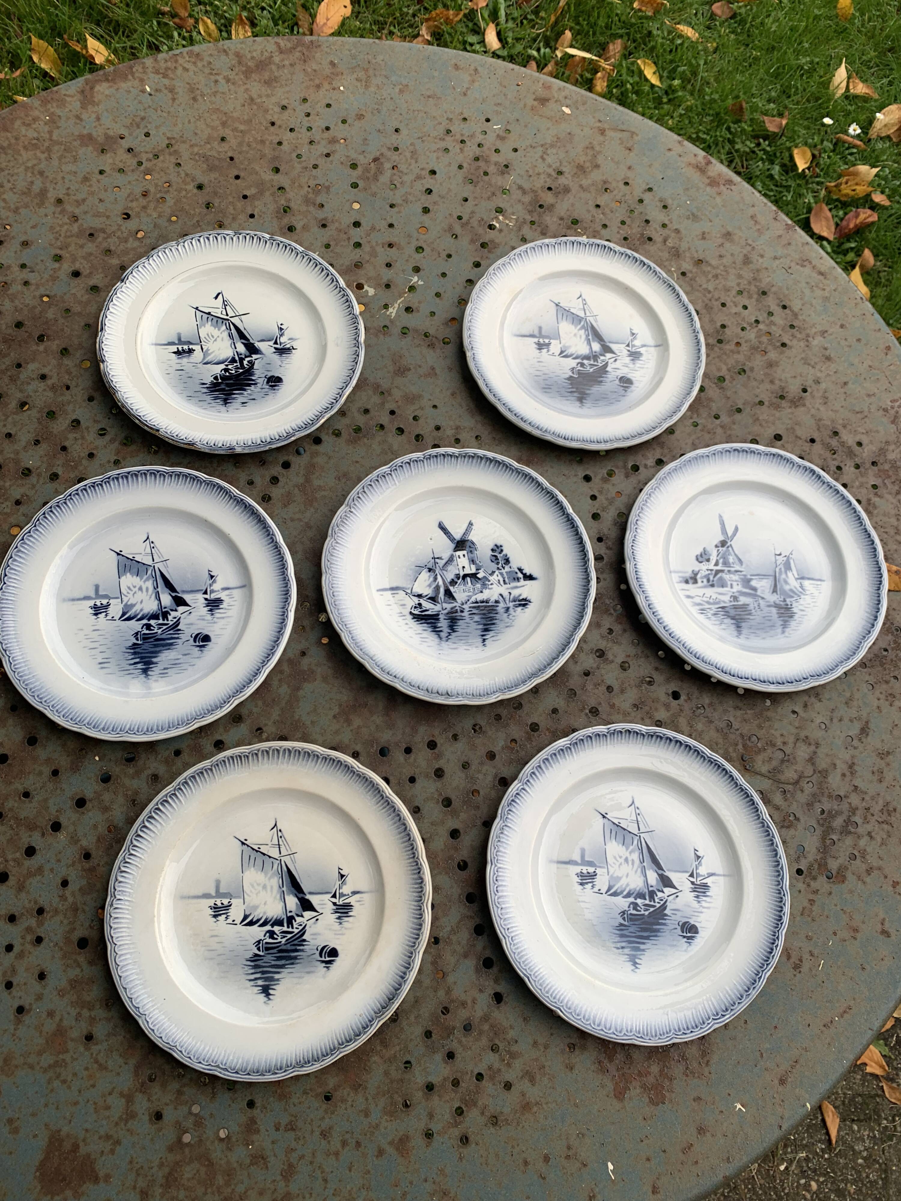 Set of 7 small dessert plates, Saint Amandinoire, Saint Amand decorated with sailboats