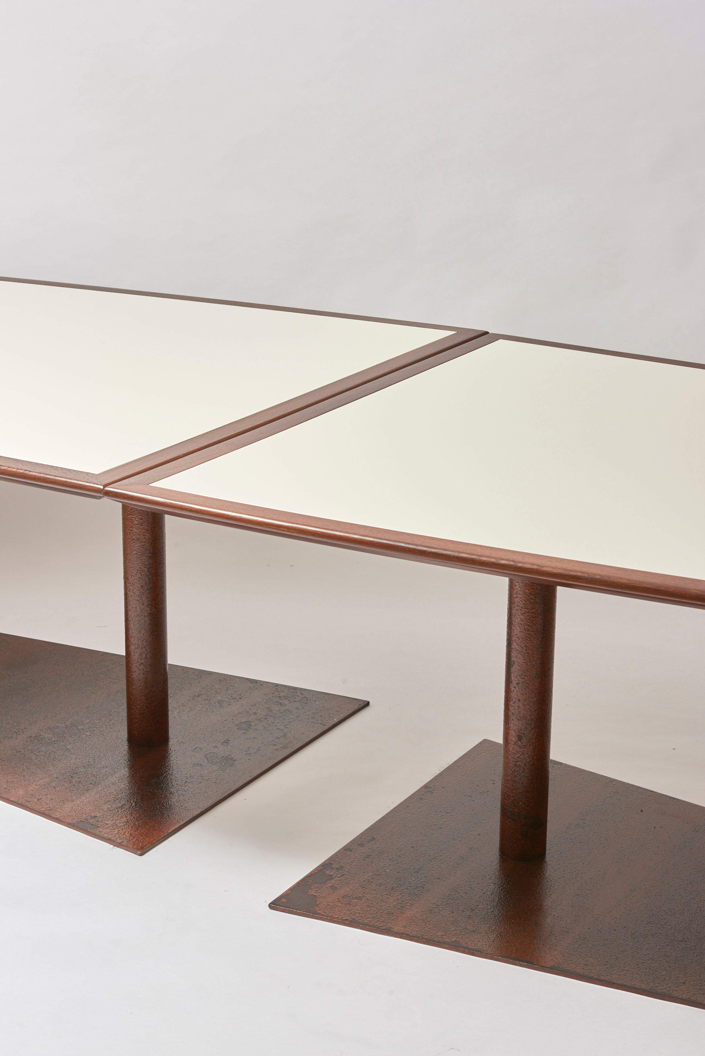 Brutalist conference table made of wood and steel