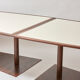 Brutalist conference table made of wood and steel