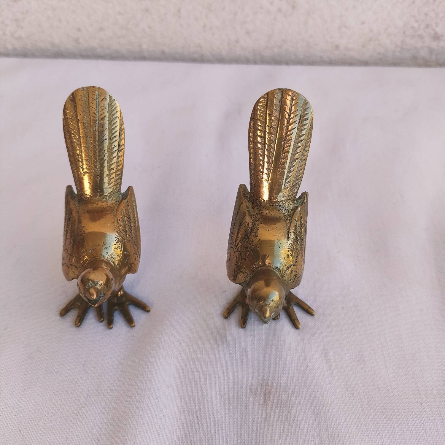 Pair of small brass birds