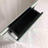 Bedside table covered with beveled mirrors on all sides