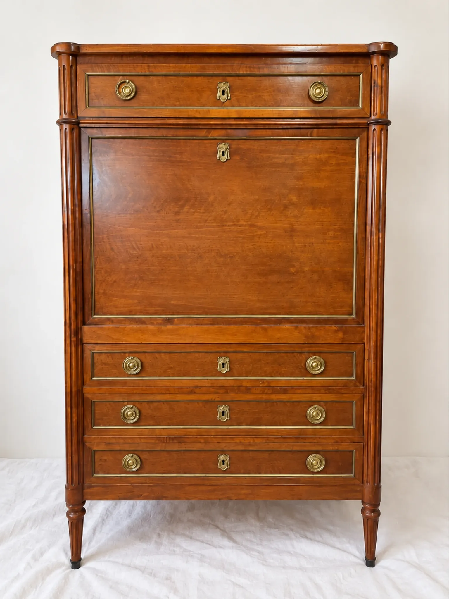 Secretary with drop-leaf in Louis XVI style – Wood, gilded brass and columns