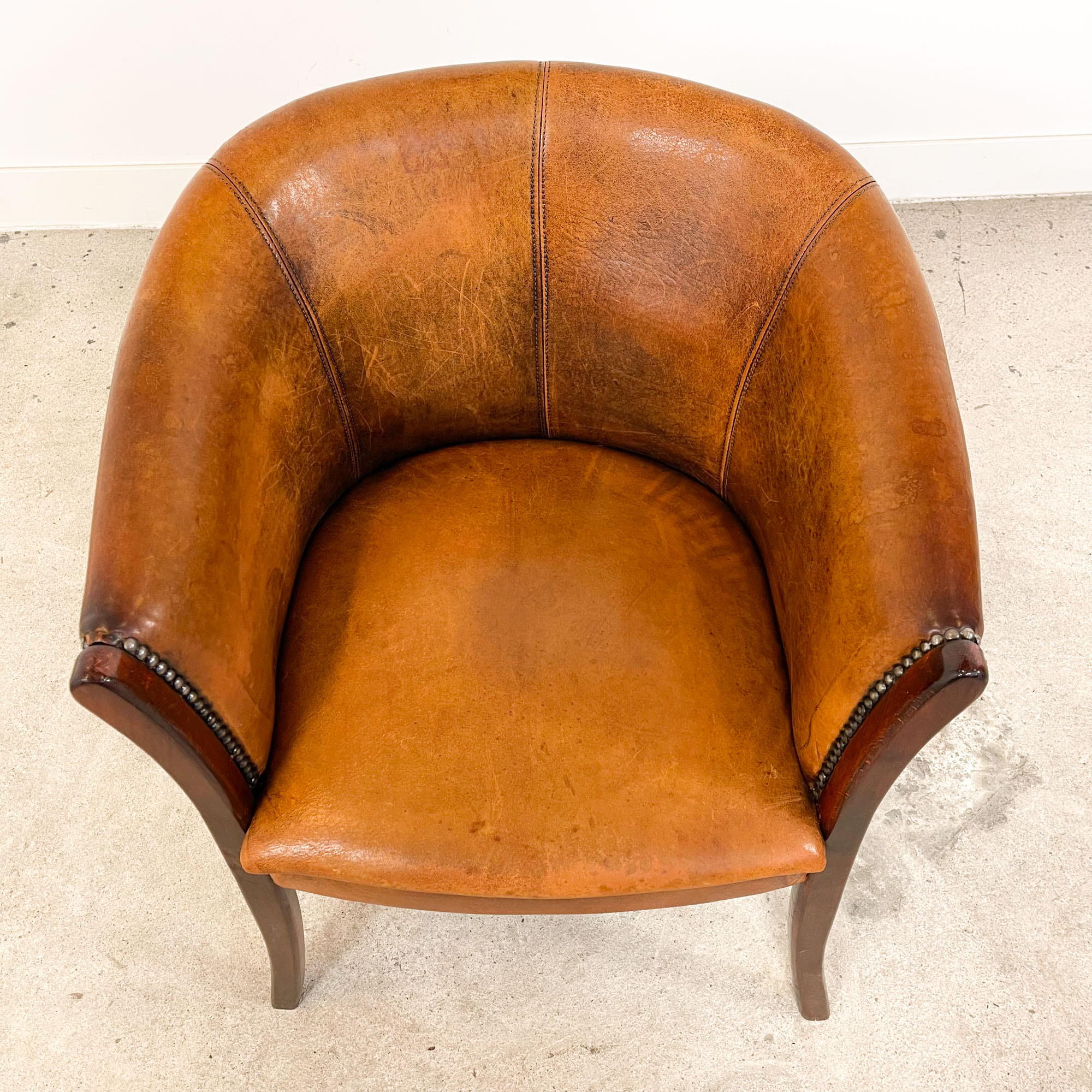 Vintage sheep leather club chair high tub Enschede