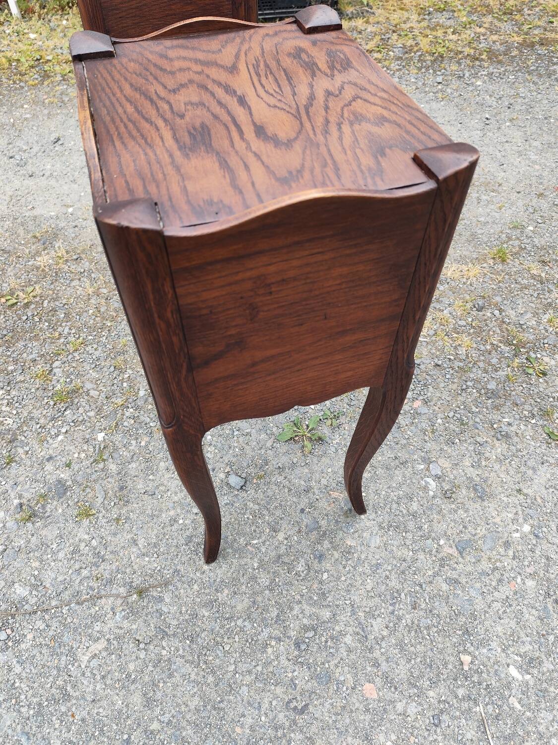 Pair of oak bedside tables with curtained niche doors