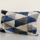 Geometric ikat velvet lumbar pillow