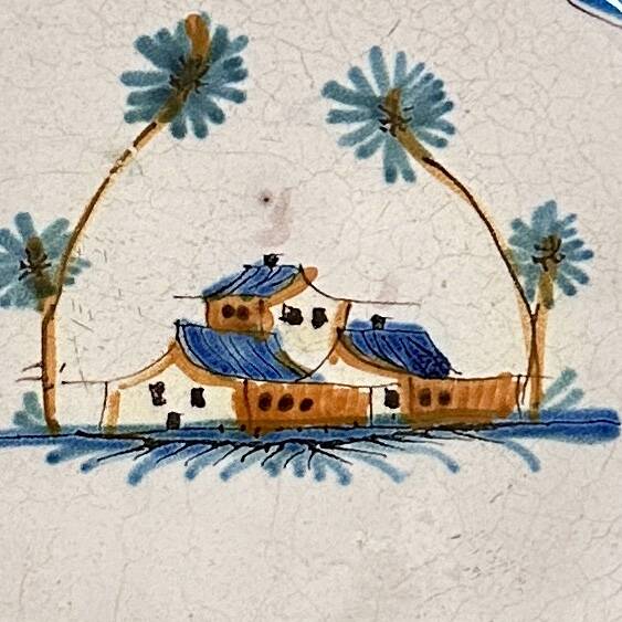 Earthenware plate with polychrome decoration - 18th century