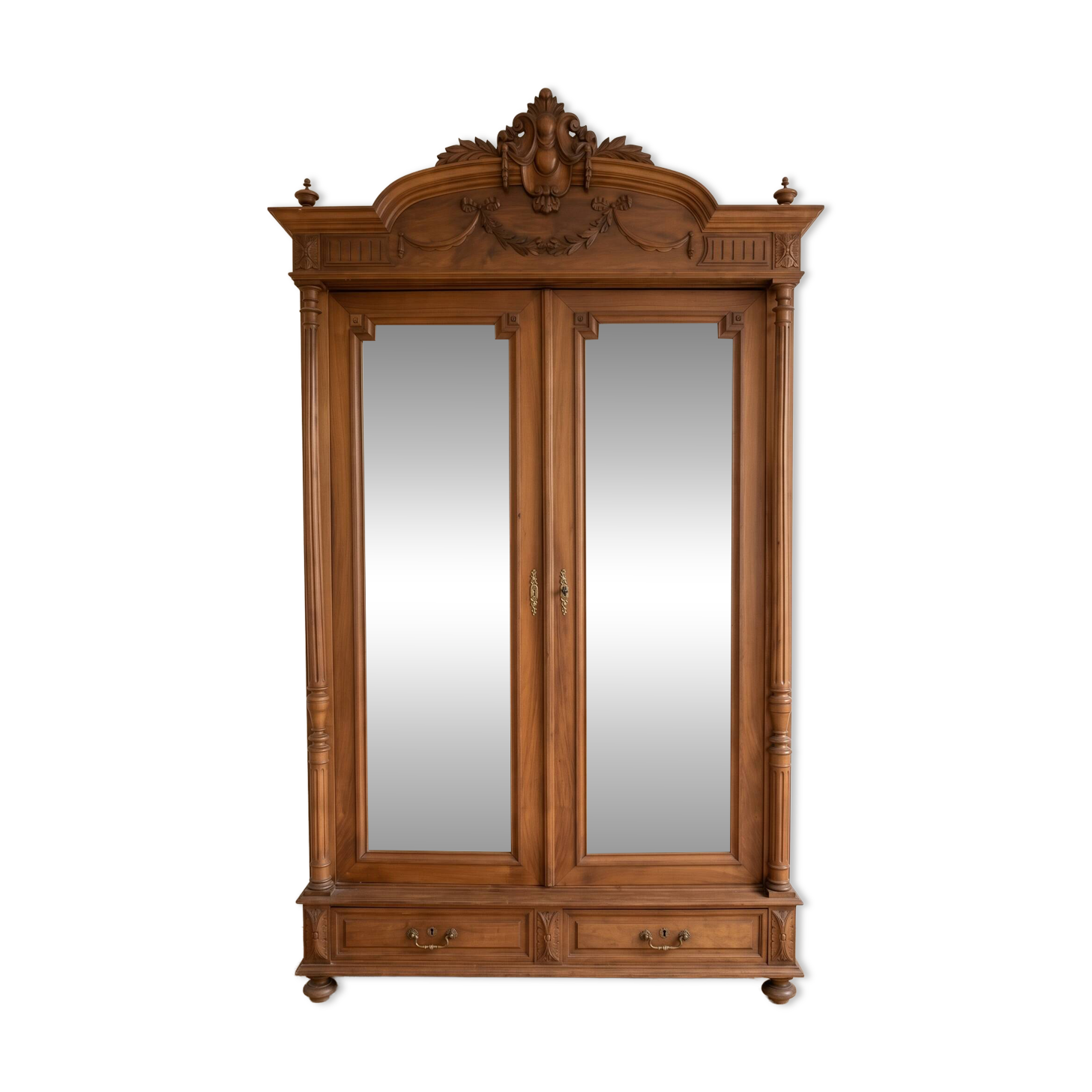 Antique solid wood wardrobe with mirror doors.