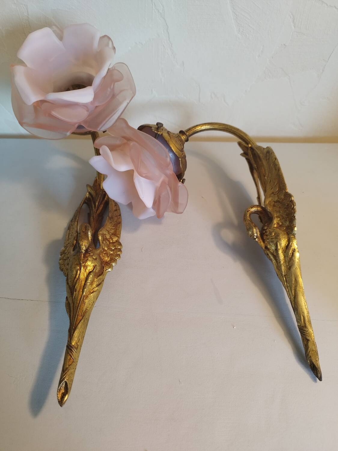Pair of bronze swan and pink tulip wall lights in glass paste