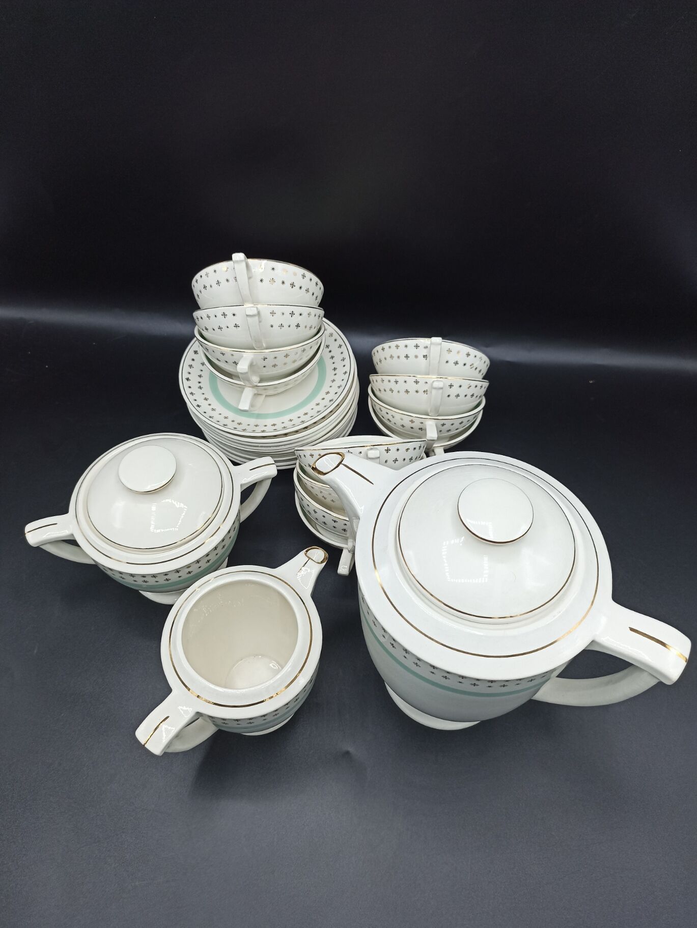 Tea set stars and mint green in semi-porcelain