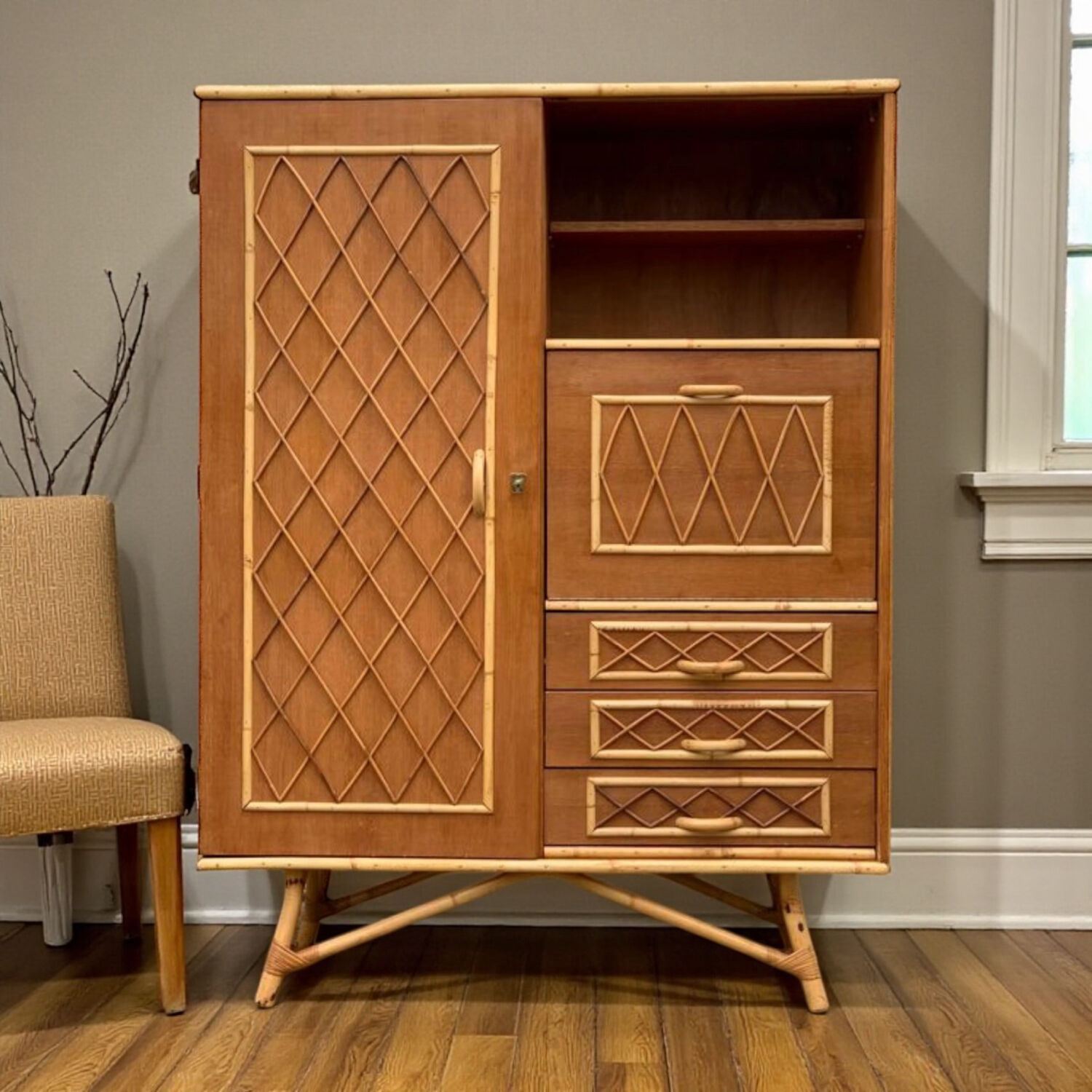 Rattan wardrobe with tapered legs from the 1960s.