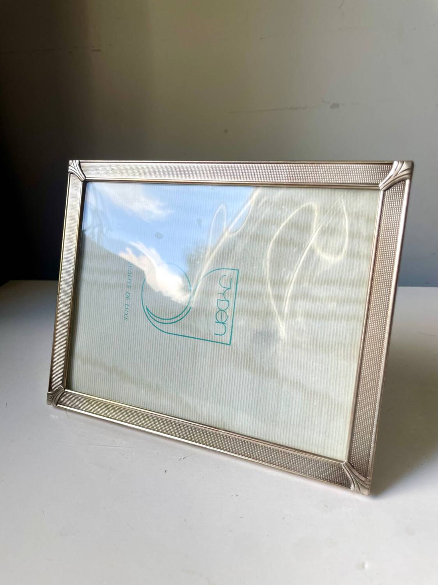 Art deco silver colored   frame 28.5 cm x 14.5 cm  convex glass