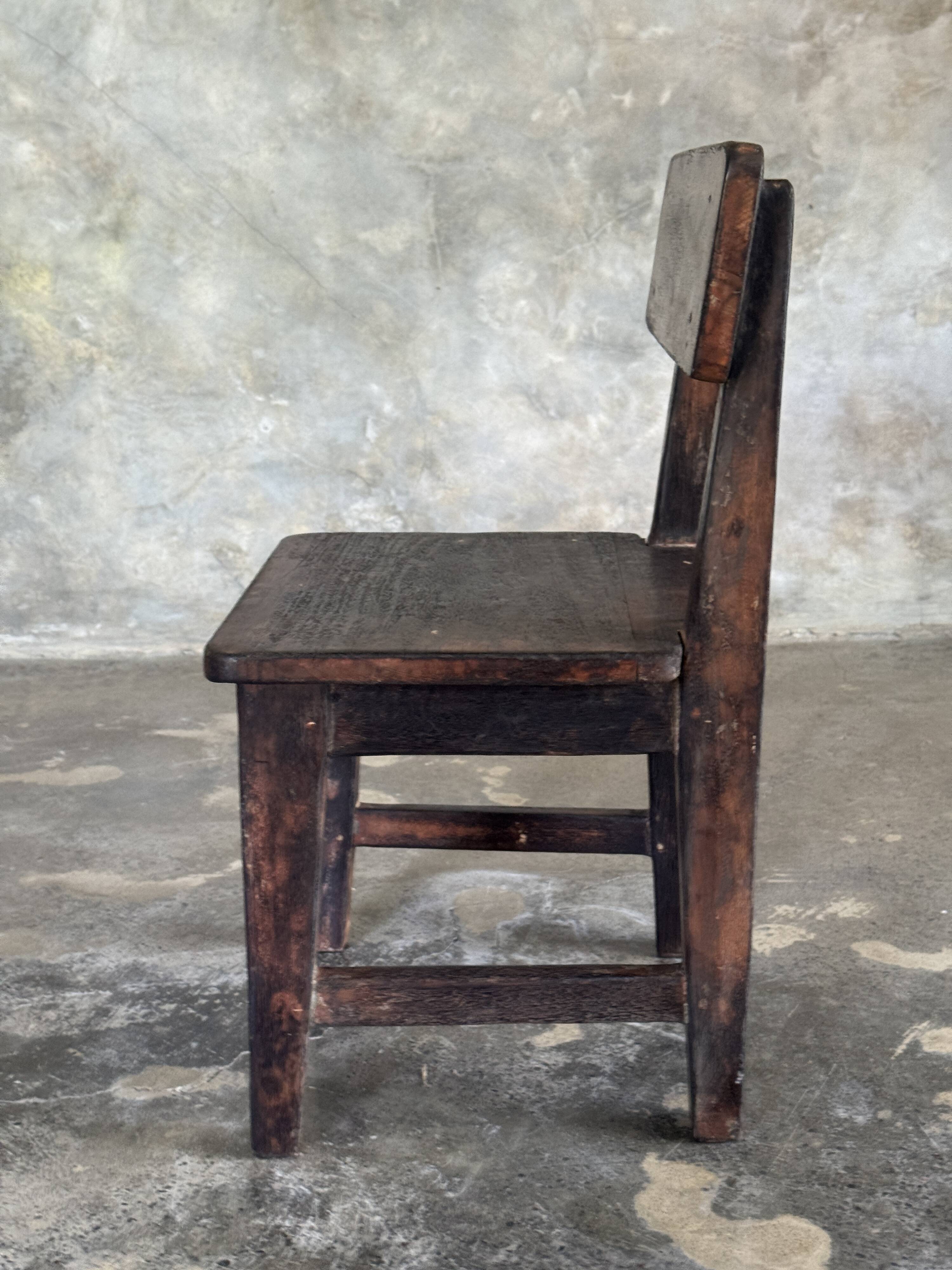 Small antique Indonesian children's chair in teak.