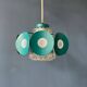 Suspension Space Age with glass shade and green/blue metal structure.