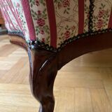 Louis Philippe style armchair with footrest from the 19th century.