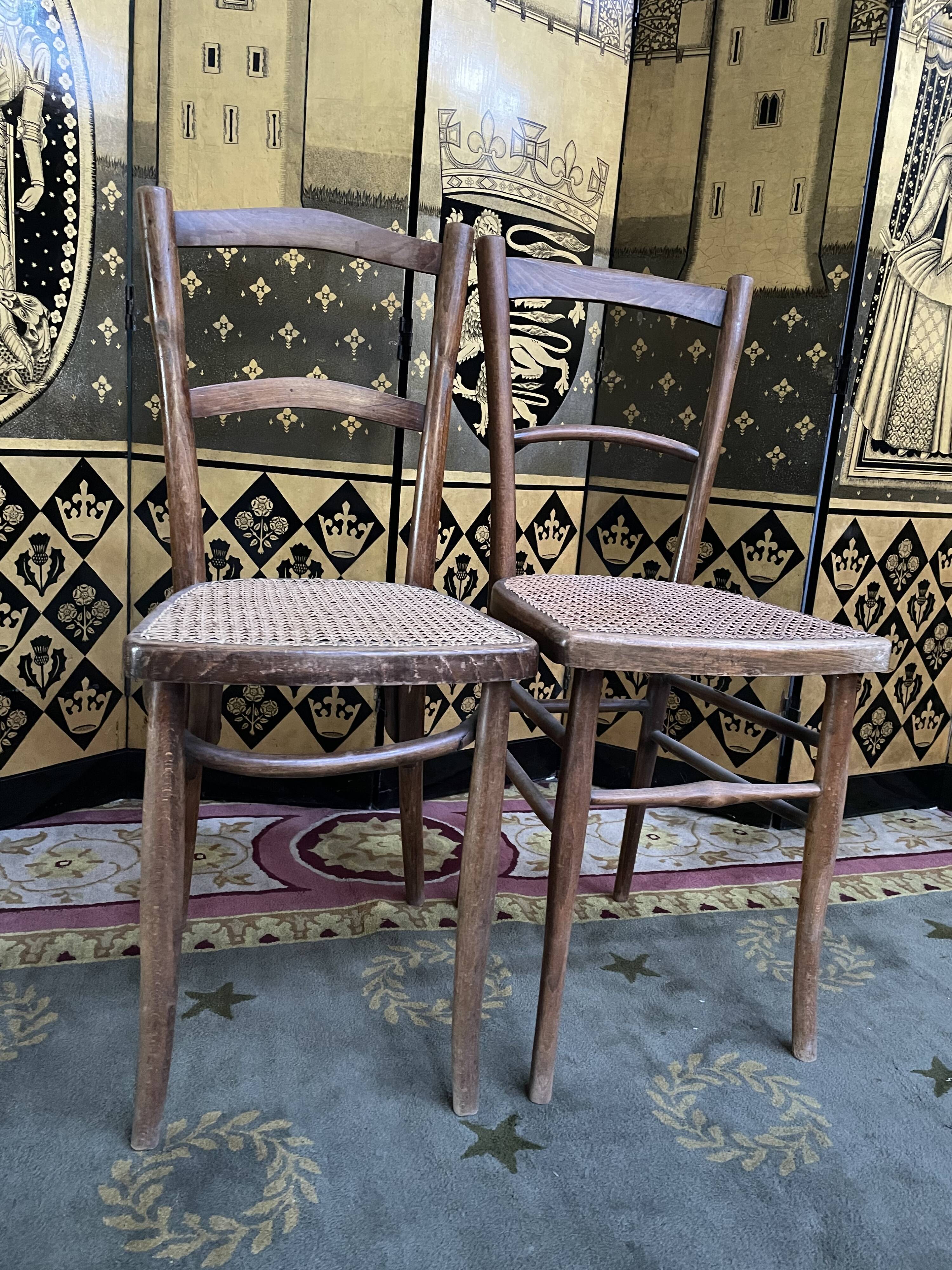 Suite of 10 bistro chairs in cannage