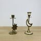 Pair of mother-of-pearl brass candlesticks with moon and sun