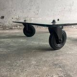 Gae Aulenti coffee table for Fontana Arte, transparent glass top with black cast iron supports, 1980s.