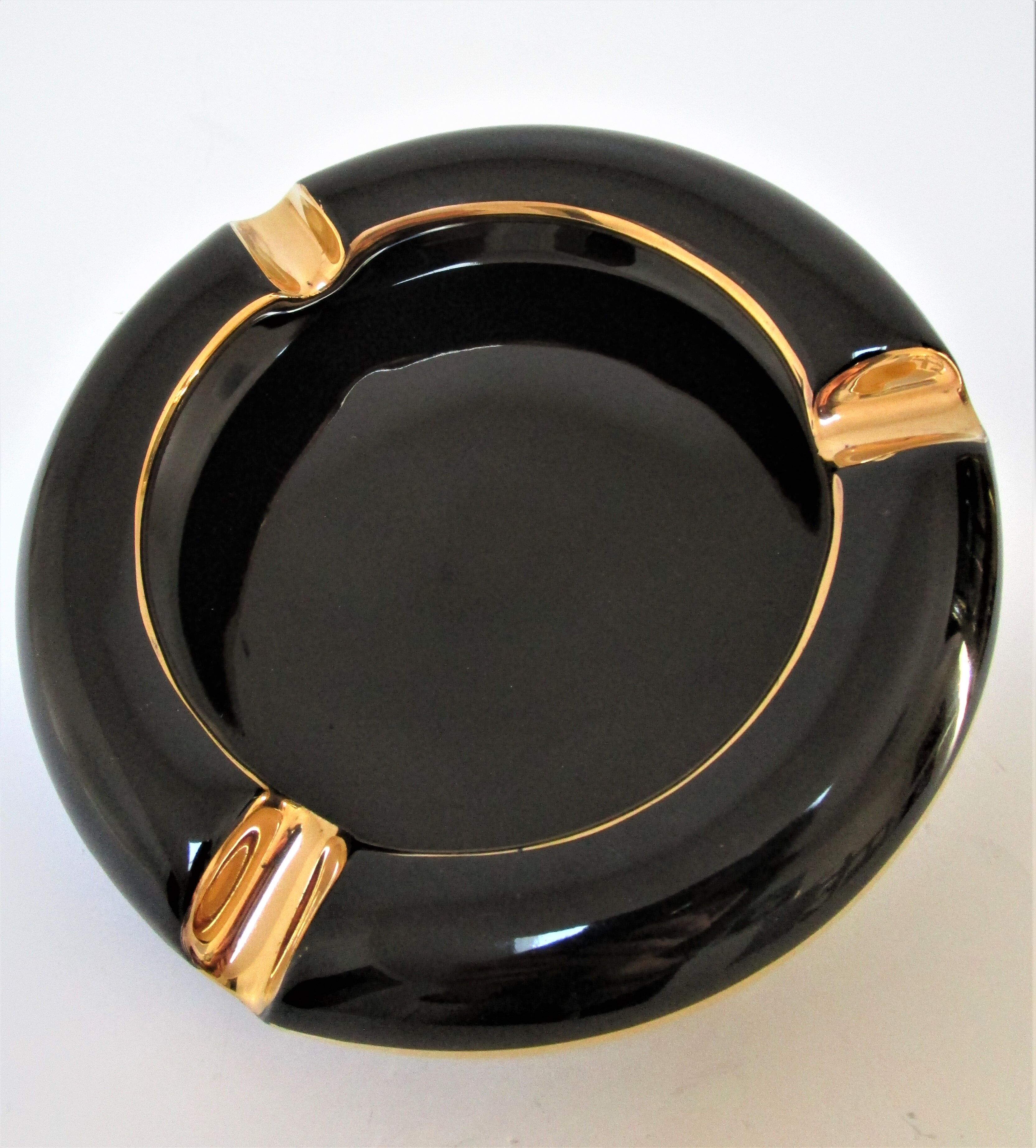Black ceramic ashtray and vintage gold 50/60