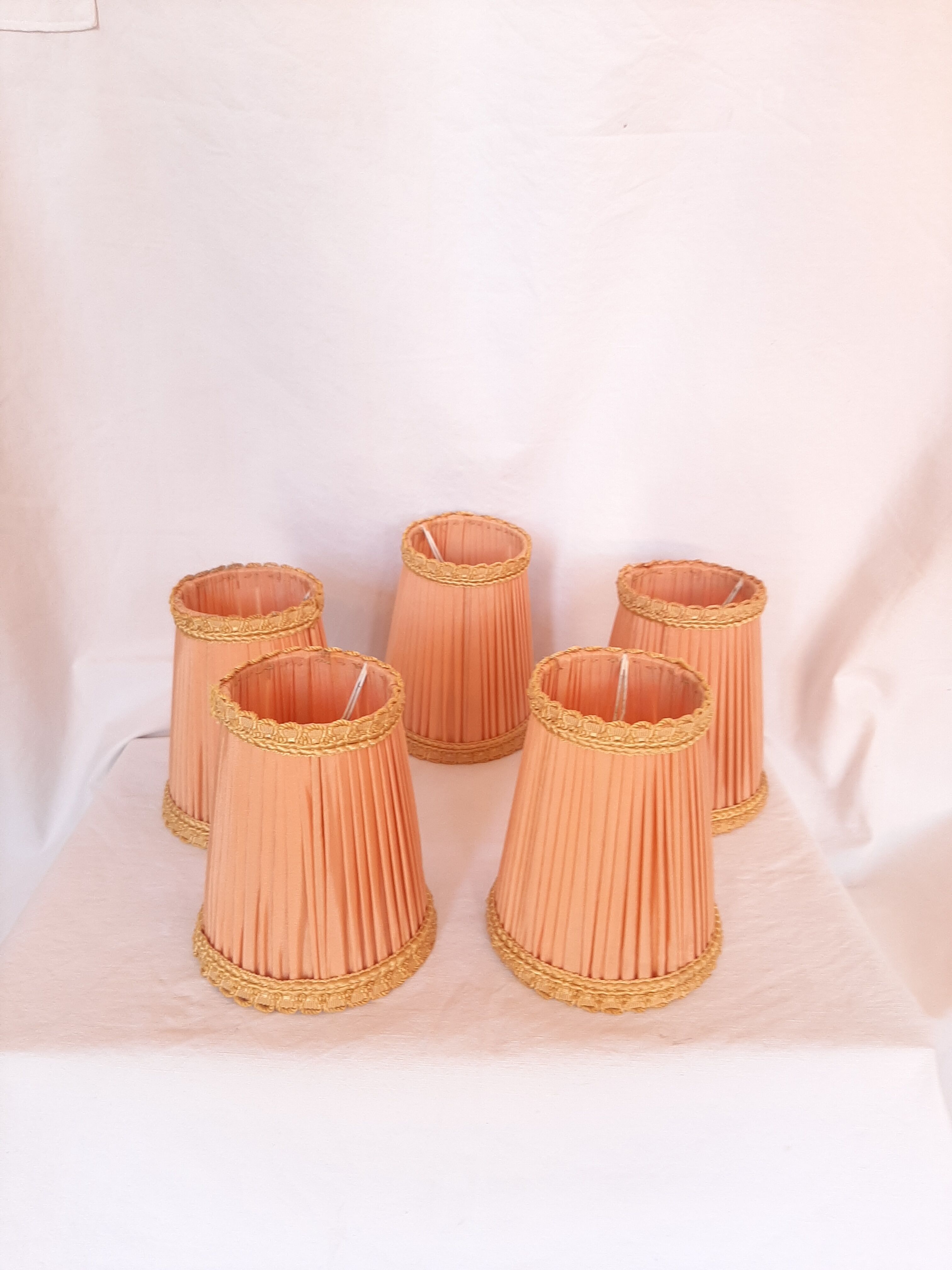 5 lampshades with clips for chandelier, 60s, pleated taffetas peach and golden trimmings