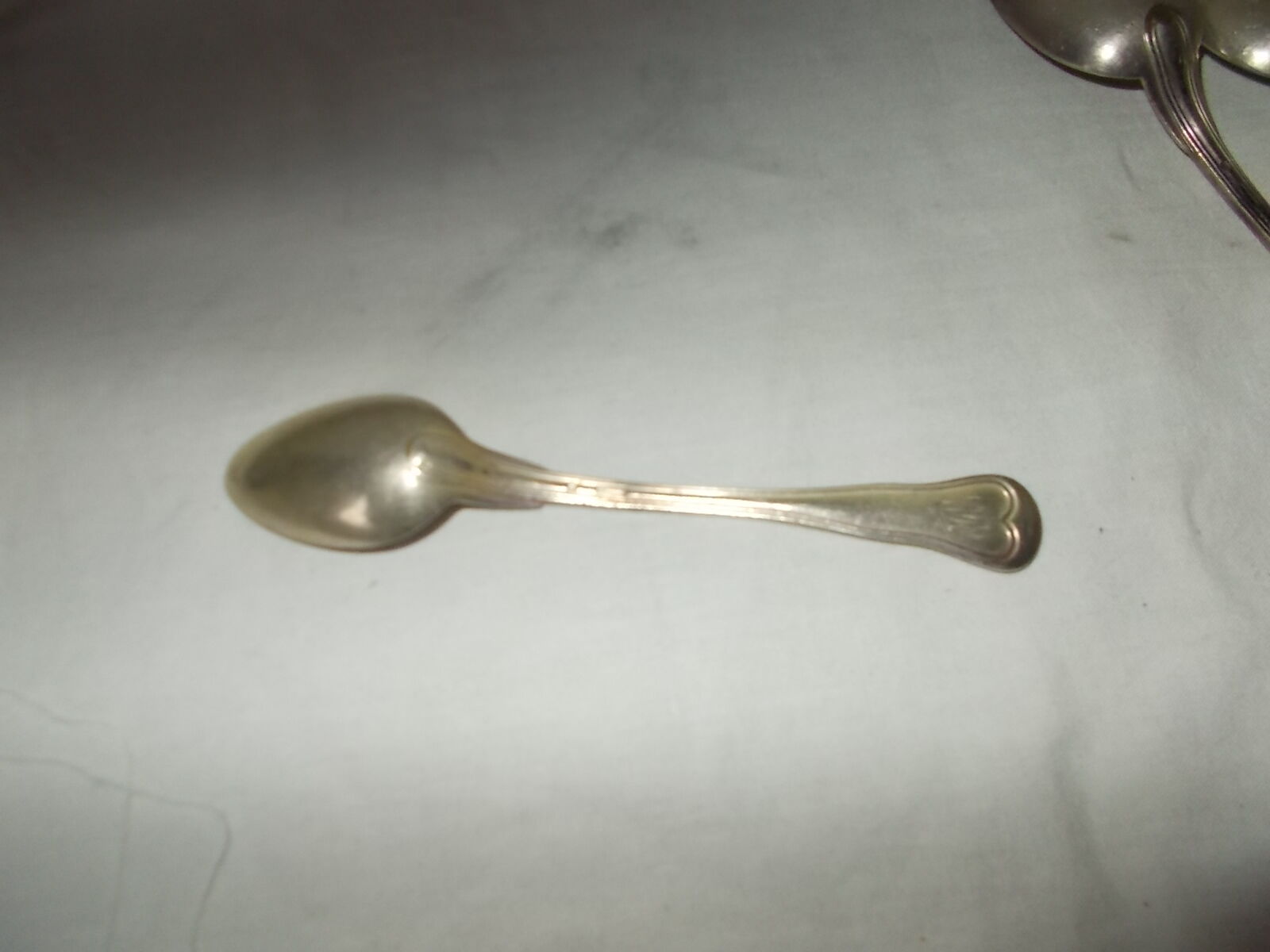 Set of 6 small silver metal spoons