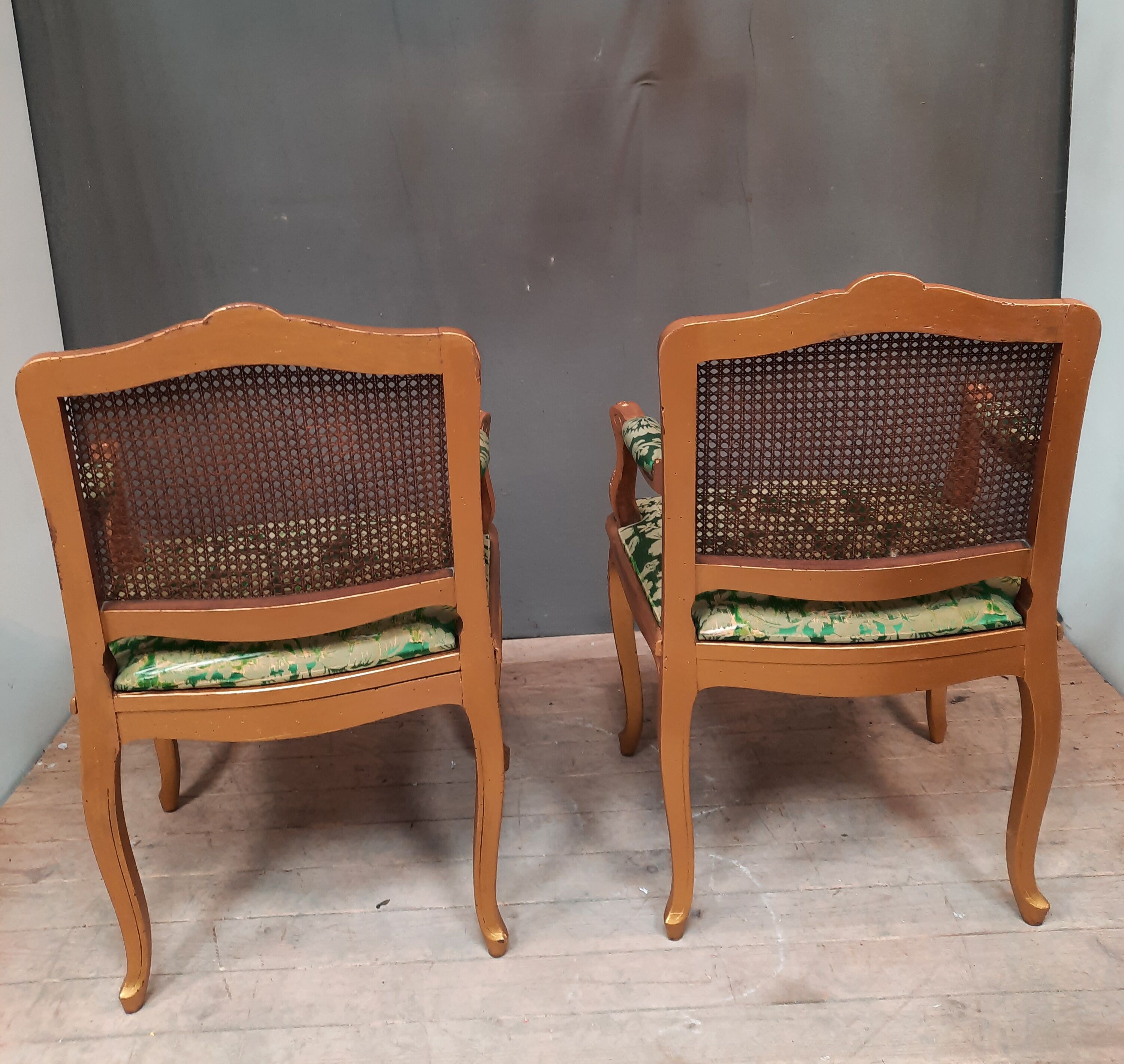 Louis XV-style golden armchair pair