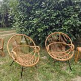 Pair of rattan shell armchairs steel feet