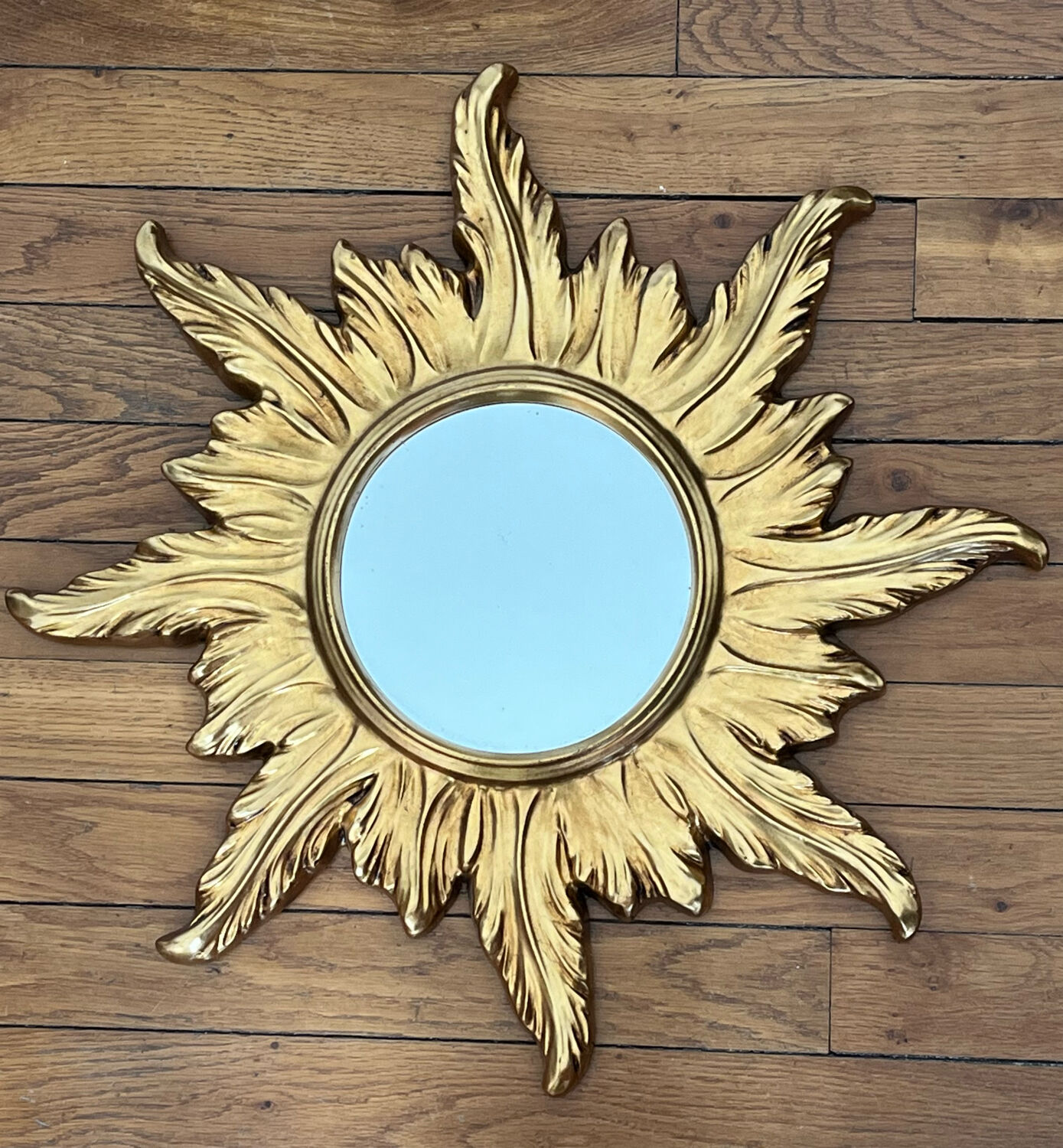 Miroir soleil en bois doré