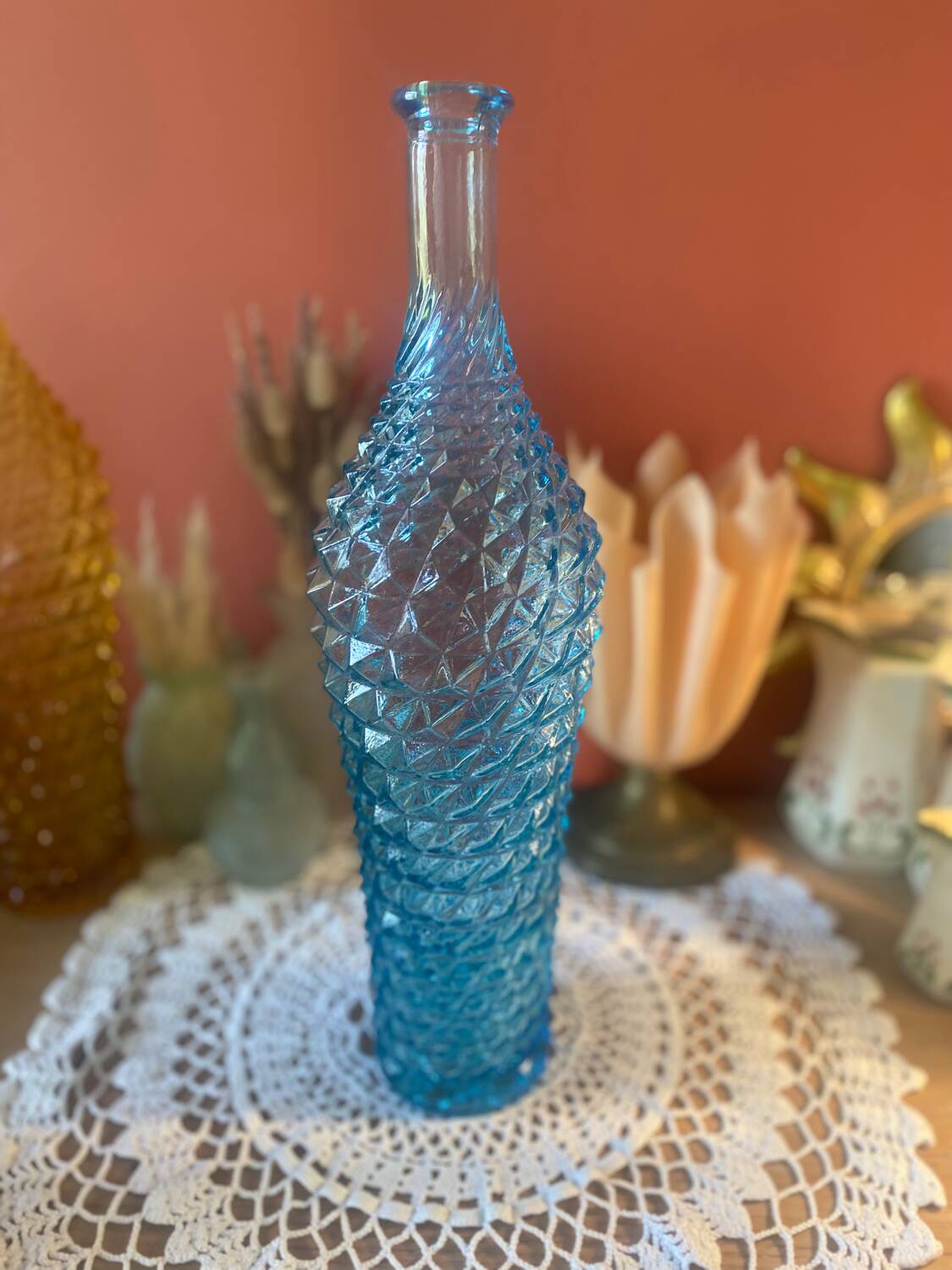 Large turquoise bottle