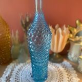 Large turquoise bottle