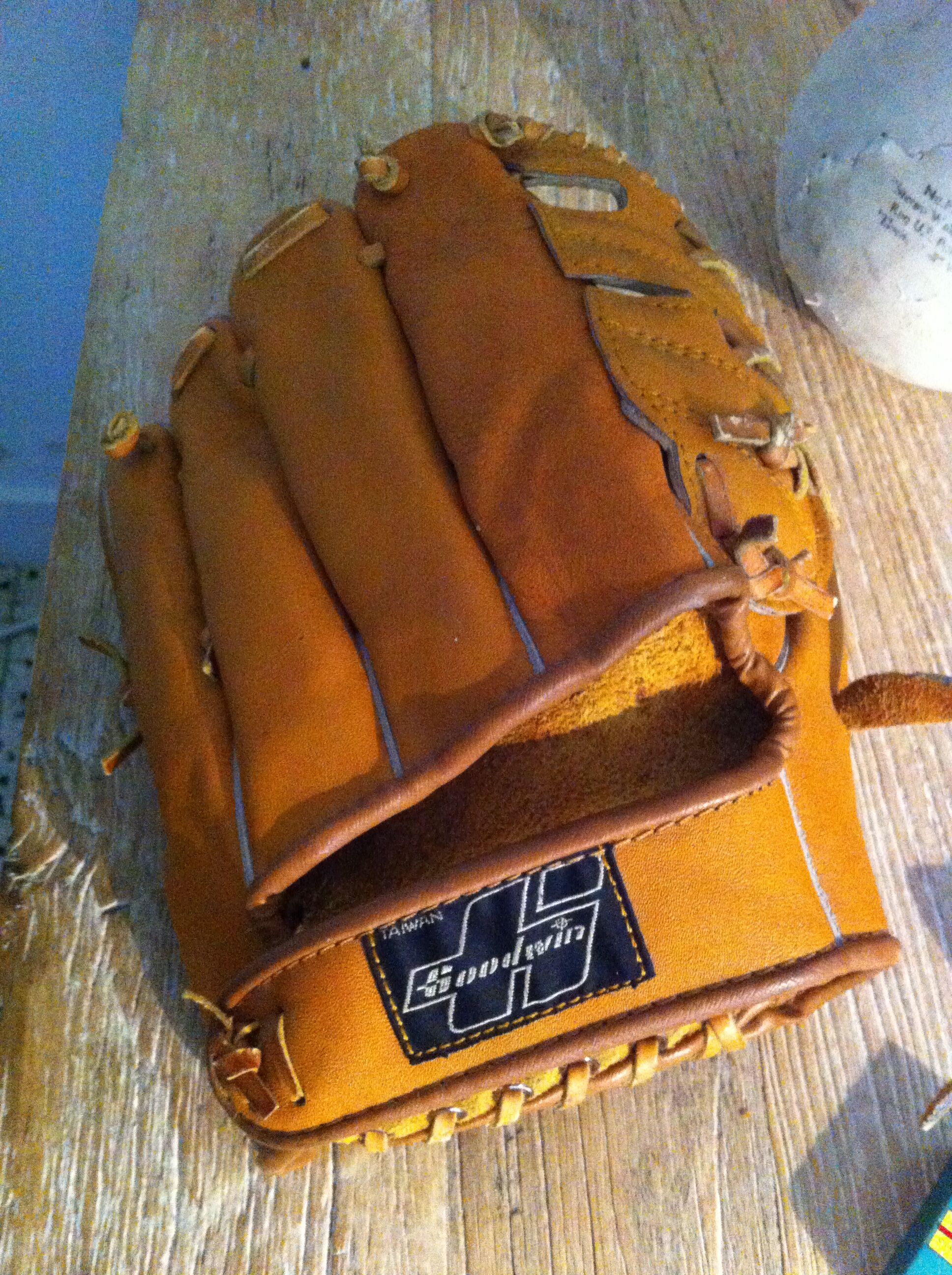 Vintage base ball glove with vintage softball