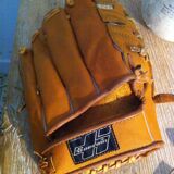 Vintage base ball glove with vintage softball