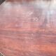 Old and large round winegrower's table made of wood.