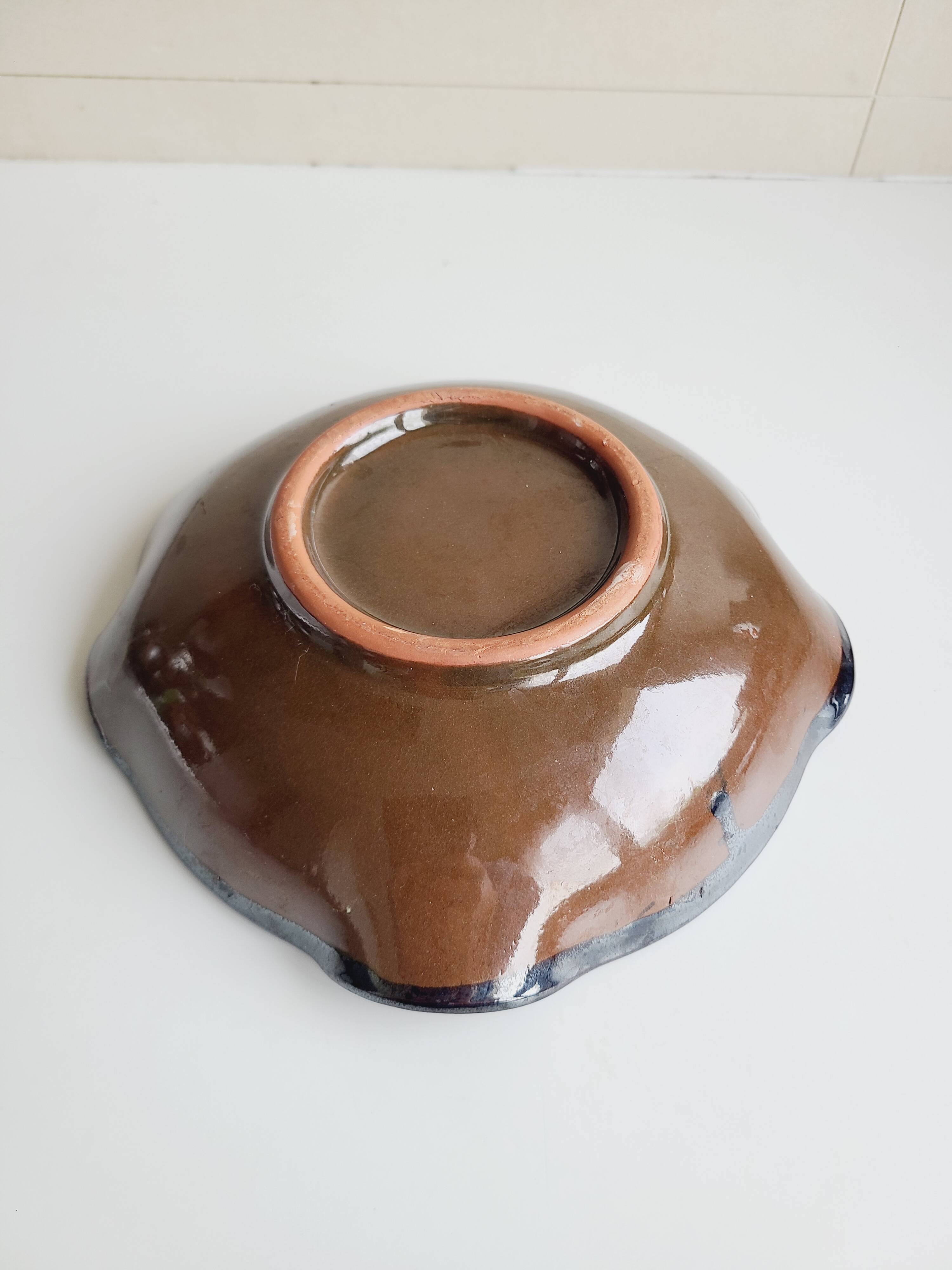 Handmade ceramic pocket emptier