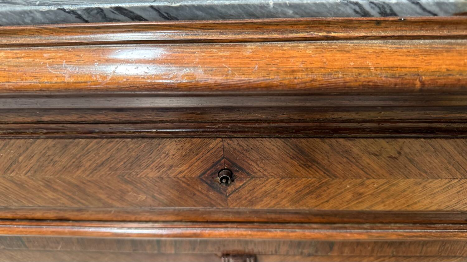 Antique chest of drawers with marble top