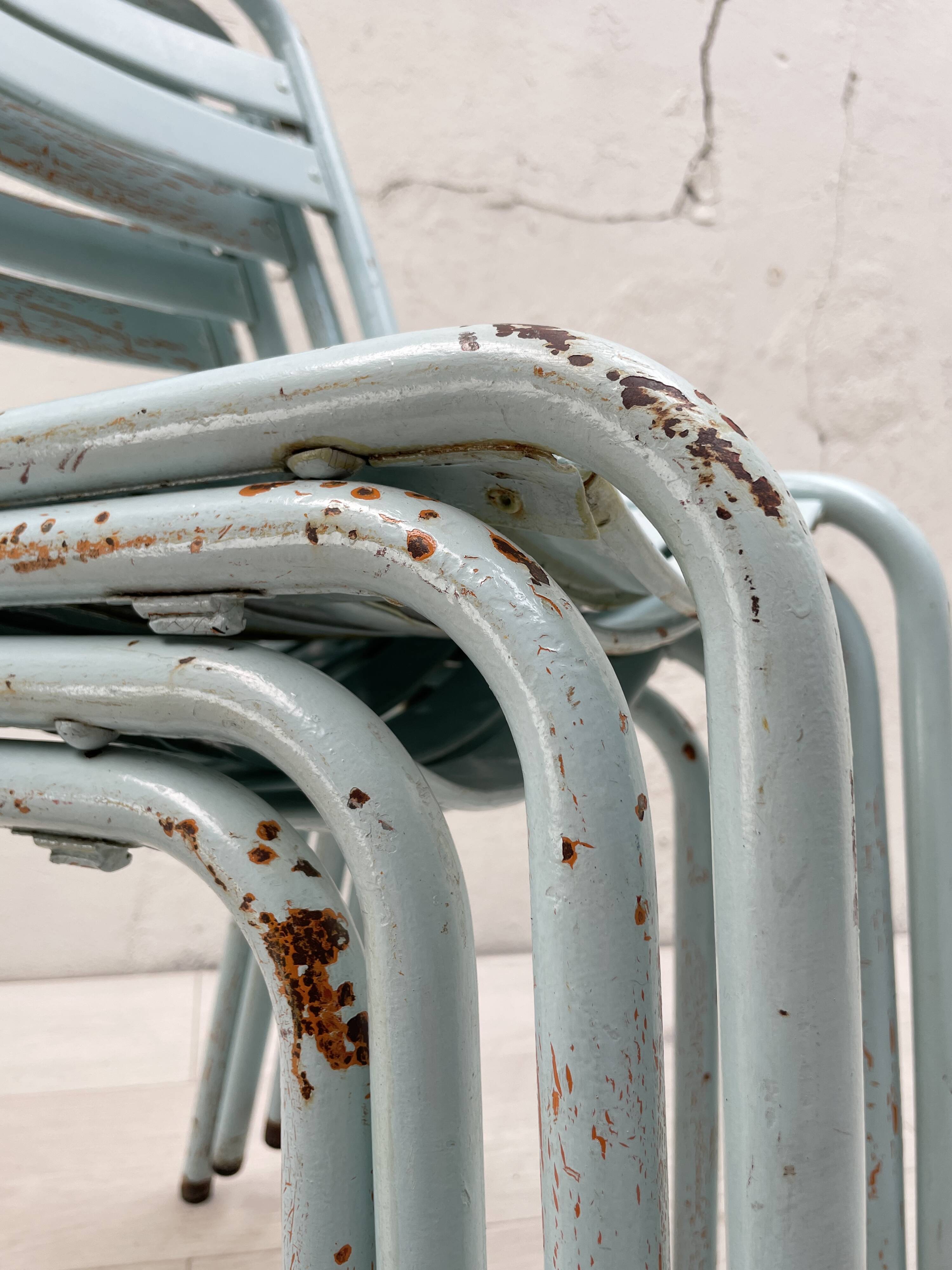 Set of four Tolix T2 chairs, circa 1950.