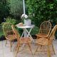 Series of 4 vintage rattan chairs.