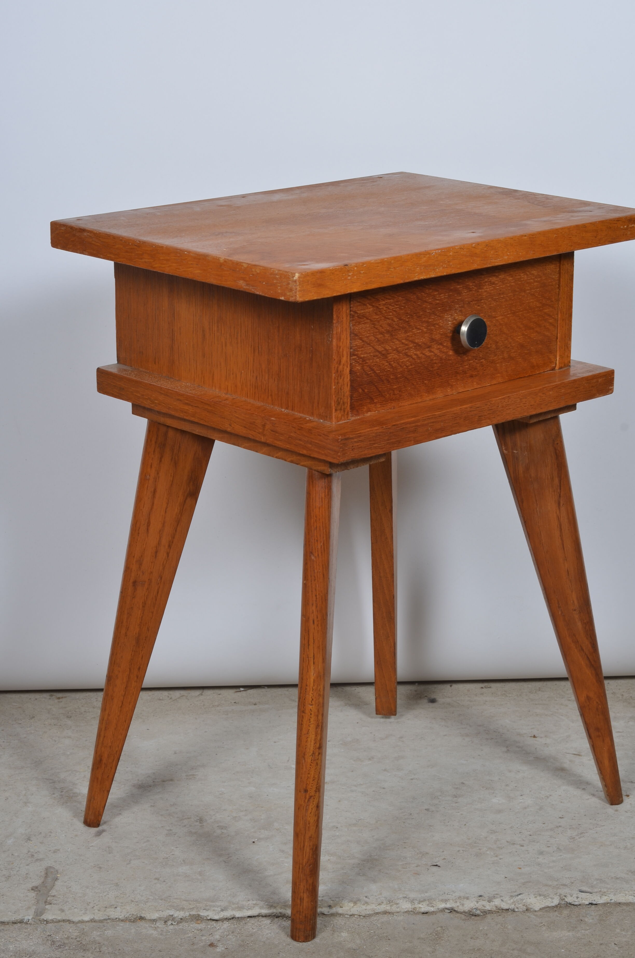 Compass feet bedside table