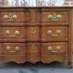 Commode arbalète en noyer XVlle, Louis XV
