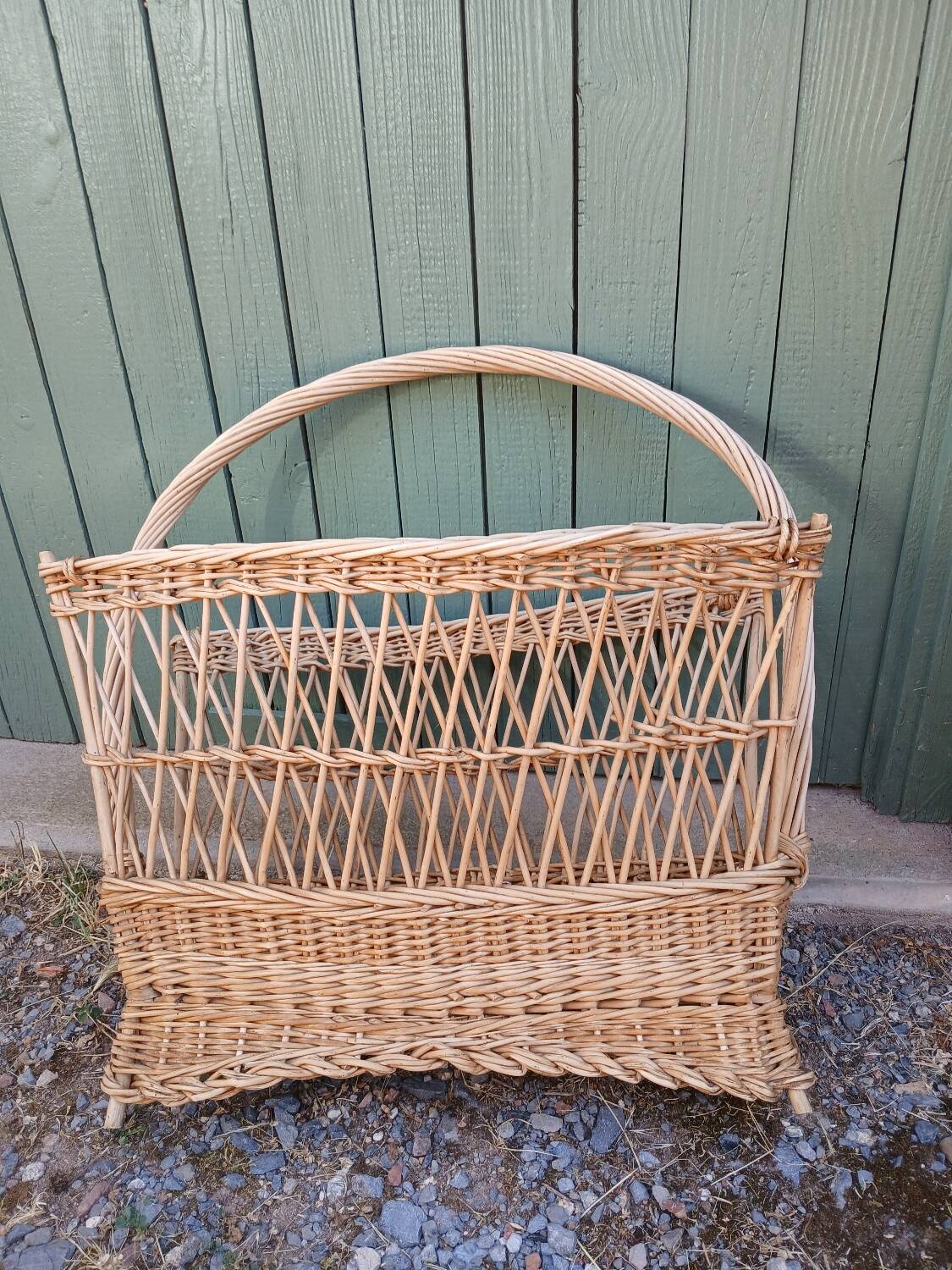 Antique wicker magazine rack