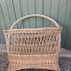 Antique wicker magazine rack
