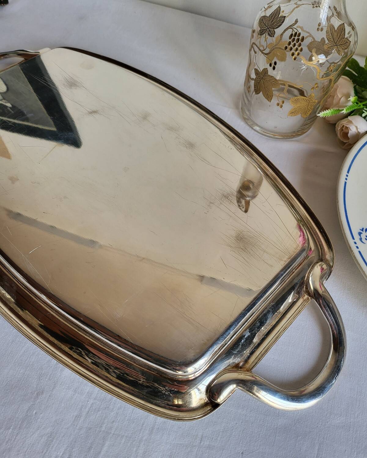 Silver-plated serving dish Quist and its asparagus cradle grid.
