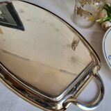 Silver-plated serving dish Quist and its asparagus cradle grid.