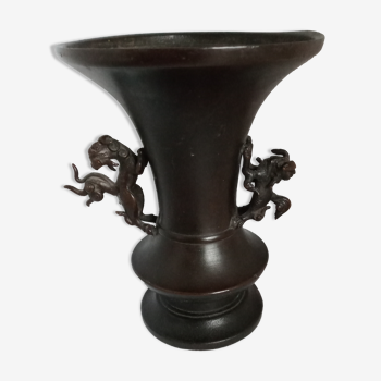 Chinese bronze vase with brown patina decorated with dragon and pho dog