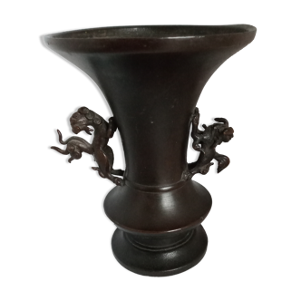 Chinese bronze vase with brown patina decorated with dragon and pho dog