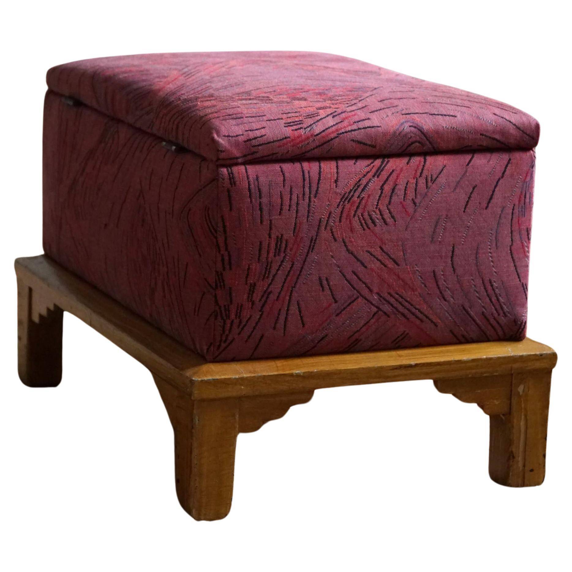 Sculptural French Art Deco stool with storage, reupholstered, made in the 1940s.