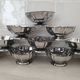 10 stainless steel dessert / ice cream bowls in Guy Degrenne style, flower shape.