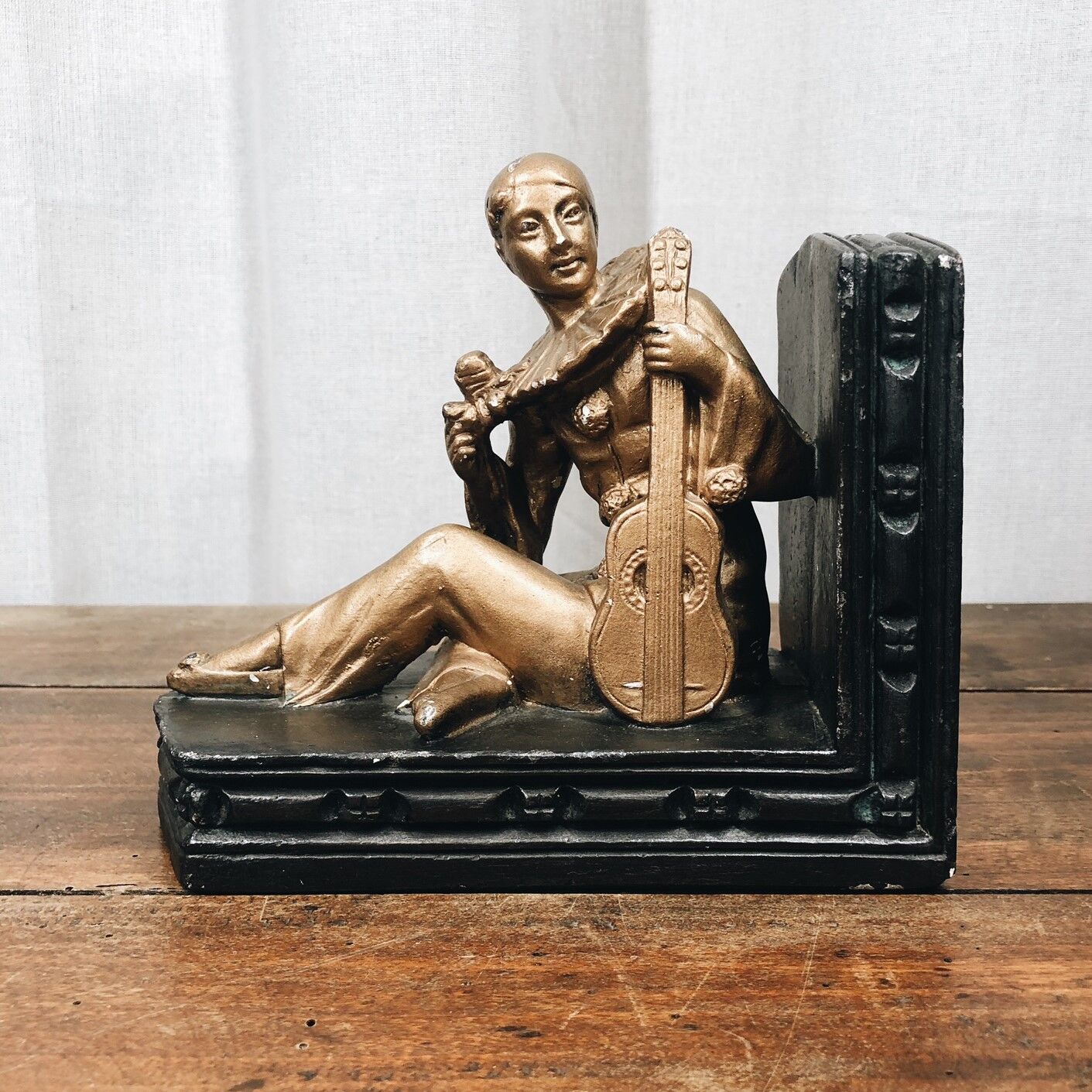 Old book clamps in black & gold plaster