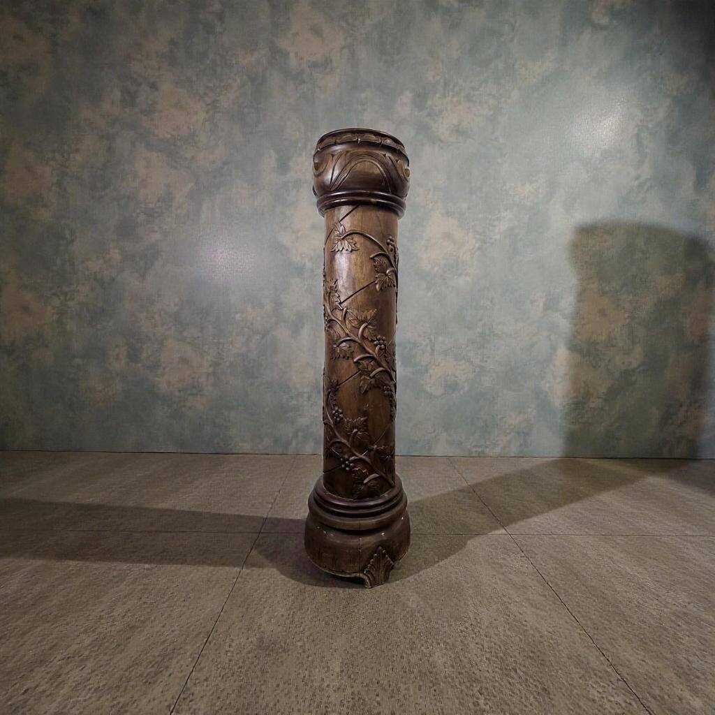 Vintage wooden column with carving